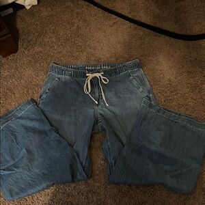 American Eagle Low Rise Ultra Wide Leg drawstring jeans